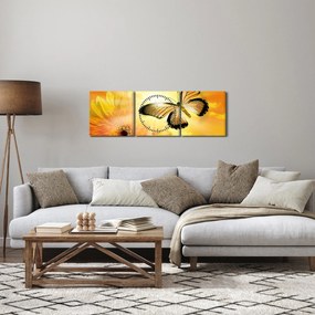 Obraz - Žltý motýľ s kvetom (s hodinami) (90x30 cm)