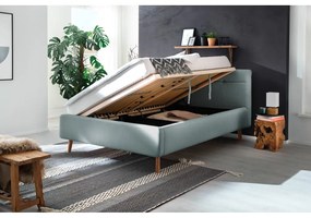 Svetlomodrá čalúnená dvojlôžková posteľ s úložným priestorom s roštom 140x200 cm Lotte – Meise Möbel