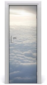 Fototapeta na dvere let nad oblaky 95x205 cm