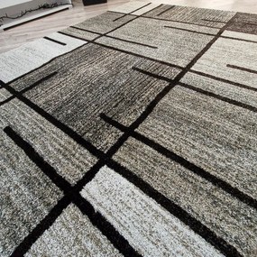 Moderný koberec s kockovaným vzorom Rio 685A béžovo-hnedý Rozmer: 120x170 cm