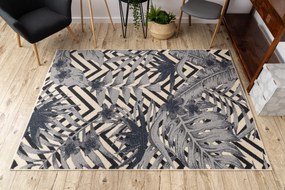 Koberec HEOS 78540  krémovo / modrý LISTY DŽUNGLE