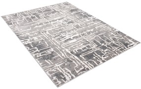Sivý dizajnový koberec so svetlým abstraktným vzorom