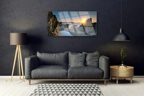 Skleneny obraz Skala pláž slnko krajina 125x50 cm