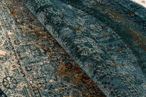 Koberec OMEGA MAMLUK tmavomodrý / hnedý kruh