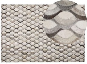 Kožený koberec 140 x 200 cm hnedá/béžová KIRCA Beliani