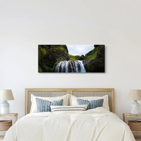 Obraz útesu s vodopádom (120x50 cm)