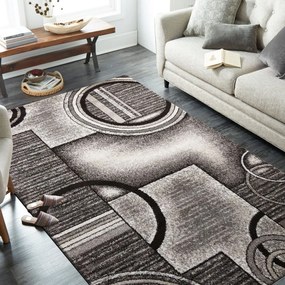 Originálny sivo hnedý koberec s motívom abstraktných kruhov Šírka: 120 cm | Dĺžka: 170 cm