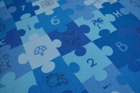 Detský guľatý koberec PUZZLE modrý