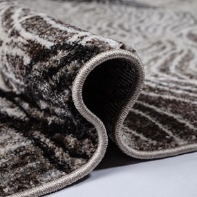 Prepracovaný hnedý koberec so zaujímavým ornamentom Šírka: 60 cm | Dĺžka: 100 cm