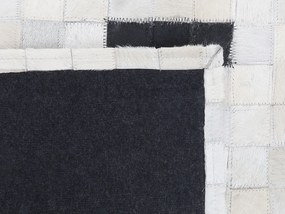 Kožený koberec 160 x 230 cm čierna/biela BOLU Beliani