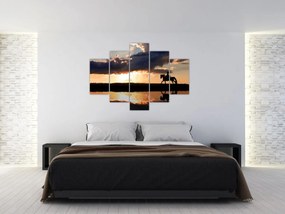 Obraz - Jazdec na koni pri západe slnka (150x105 cm)