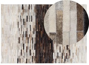 Kožený koberec 140 x 200 cm hnedá/béžová SINNELI Beliani