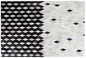 Kožený koberec 140 x 200 cm biela/čierna/béžová MALDAN Beliani