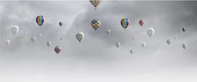 Obraz - Balóny nad tehlovou stenou (120x50 cm)
