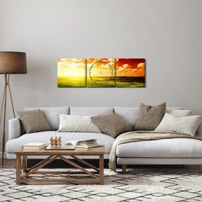 Obraz lúky so žiariacim slnkom (s hodinami) (90x30 cm)