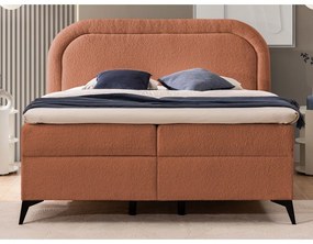 Oranžová boxspring posteľ s úložným priestorom 140x200 cm Ornes – Ropez