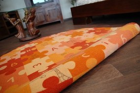 Detský guľatý koberec PUZZLE oranžový