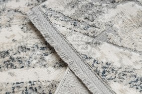 Koberec TULS 51328 s abstraktným vzorom, slonovinová sivá