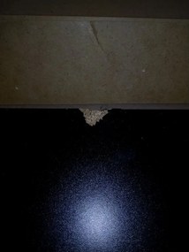 AKCIA Závesná TV skrinka MEORATI 150x40 cm, čierna/dub artisan II. akosť