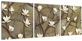 Obraz - Biele magnólie na kamennom murive (s hodinami) (90x30 cm)