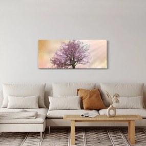 Obraz rozkvitnutého stromu na vrchole kopca (120x50 cm)