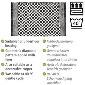 Čiern-obiela kúpeľňová predložka z recyklovaného plastu 50x80 cm Tara – Wenko