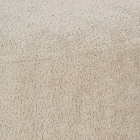 Béžový taburet z textílie buklé – Ixia