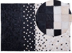 Kožený koberec 140 x 200 cm čierna/béžová ERFELEK Beliani