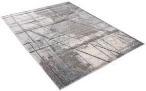 Béžovo-sivý dizajnový koberec s abstraktným vzorom