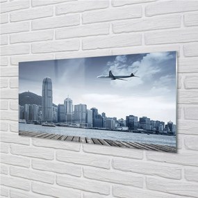 Obraz na skle Lietadiel mraky město 125x50 cm