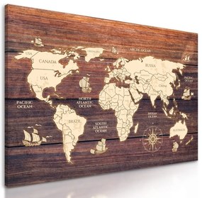 Obraz mapa sveta na drevenom podklade