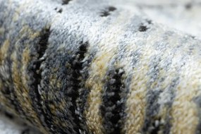 Koberec DE LUXE 2087 Jodelka Chevron vintage - zlatý / sivý