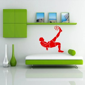 Veselá Stena Samolepka Futbalista vykopáva Farba: červená, Veľkosť: 40 x 43 cm