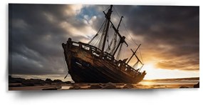 Sablio Obraz Vrak lode pri západe slnka - 110x50 cm