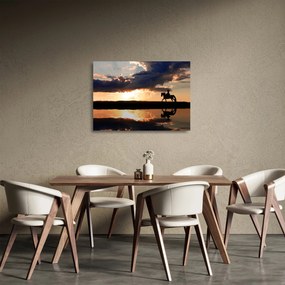 Sklenený obraz - Jazdec na koni pri západe slnka (70x50 cm)