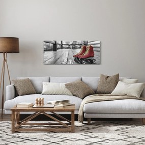 Obraz červených starých kolieskových topánok (120x50 cm)