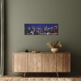 Obraz - Osvetlené New Yorské mrakodrapy (s hodinami) (90x30 cm)