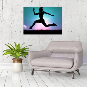 Sklenený obraz skákajúce siluety ženy (70x50 cm)