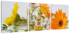 Obraz oranžových kvetín (s hodinami) (90x30 cm)