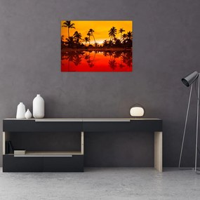 Sklenený obraz - Západ slnka nad rezortom (70x50 cm)
