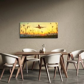 Obraz vzlietajúceho lietadla (120x50 cm)