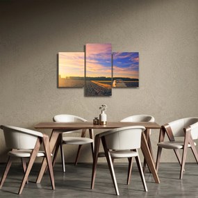 Obraz žltého auta v poli (90x60 cm)