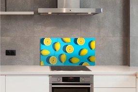 Sklenený obklad do kuchyne Citróny na modrom pozadí 100x50 cm