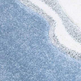 Krásny modrý okrúhly koberec biela labuť