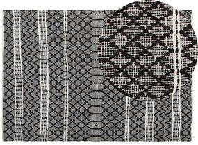 Kožený koberec 140 x 200 cm čierna/béžová FEHIMLI Beliani