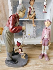 Dekorácia muž s bábkou Pinocchio - 16*14*36 cm