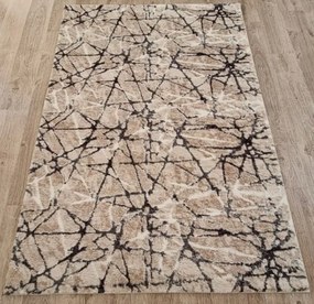 Béžový huňatý koberec Plush Deluxe – mramorový vzor Rozmer: 50x80 cm