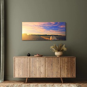 Obraz žltého auta v poli (120x50 cm)