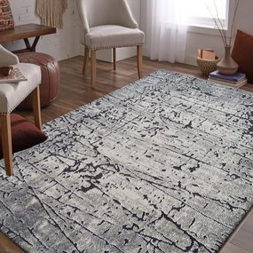 Moderný abstraktný sivý koberec Šírka: 120 cm | Dĺžka: 170 cm