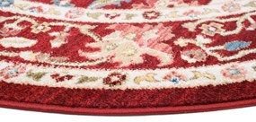 Červený okrúhly koberec vo vintage štýle